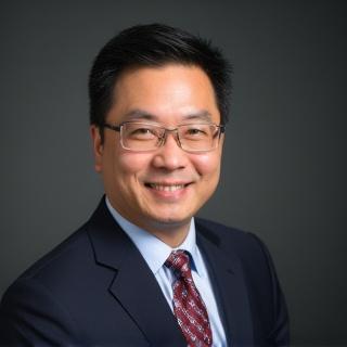 Professional headshot of David Chen
